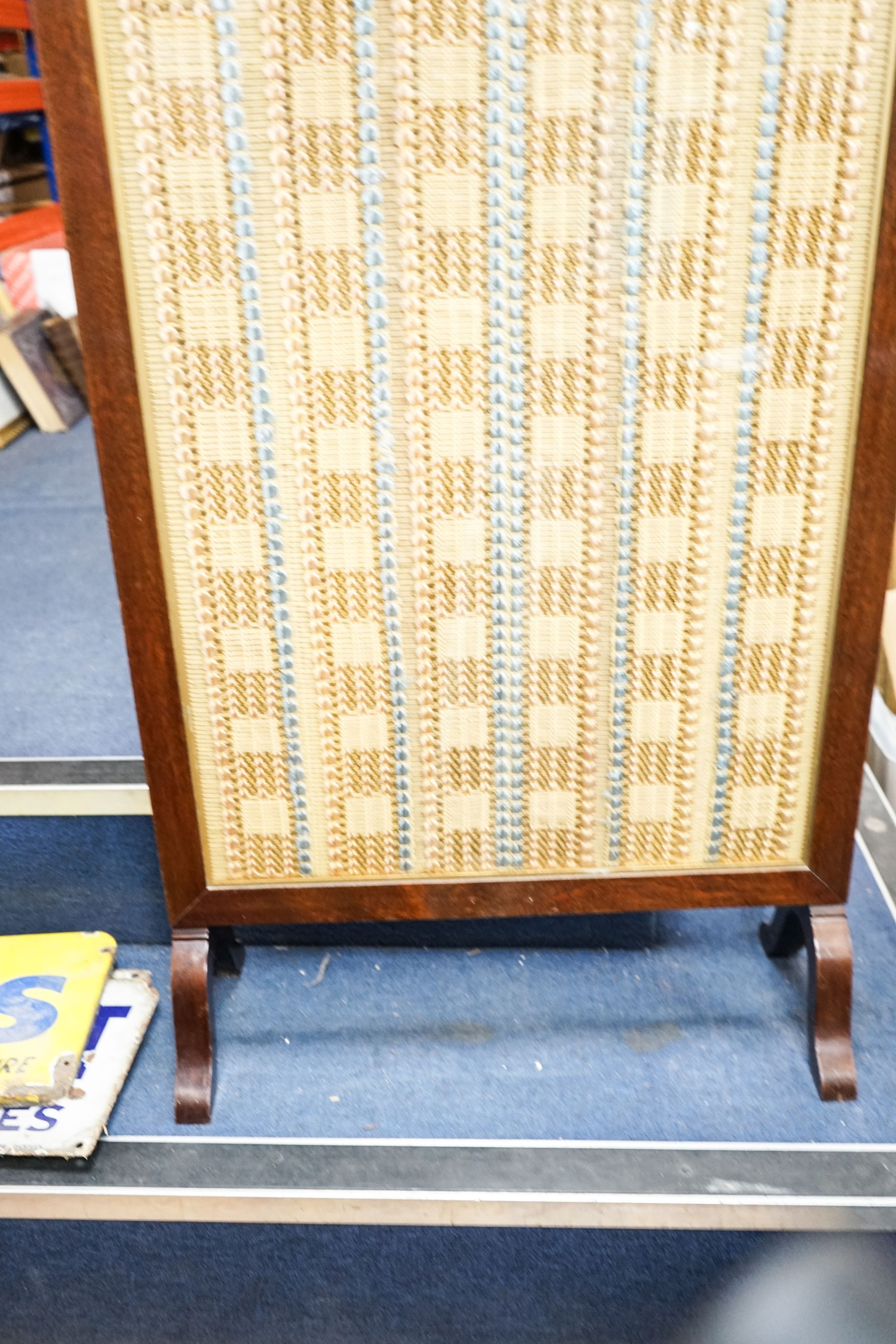 A mahogany cased and glazed embroidered fire screen of Royal interest 108 x 62cm.